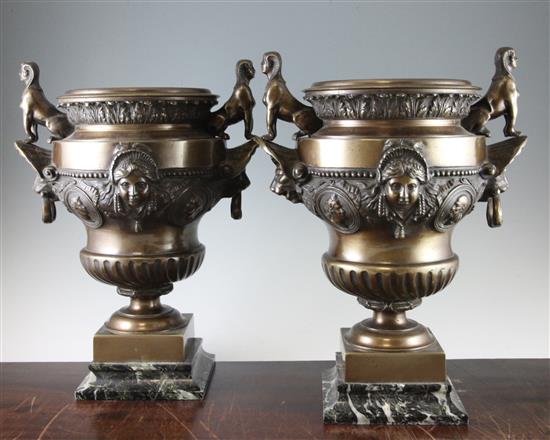 A pair of French Egyptian revival bronze urns, 16.5in.